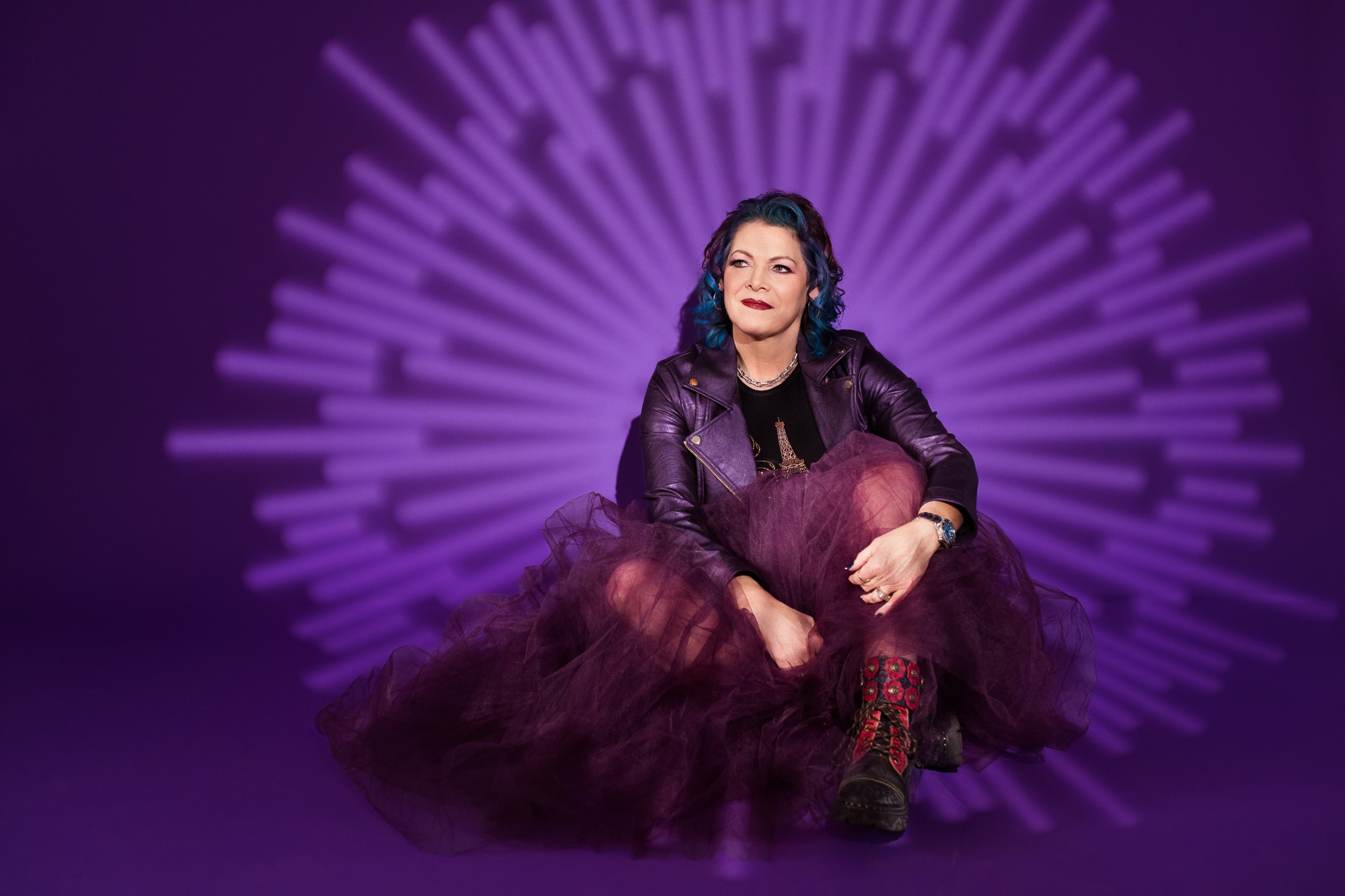 Woman in a tulle dress sitting on the ground, Mothe'rs Day portraits in Calgary